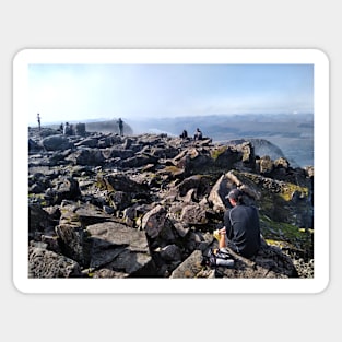 Climbers rest at the summit of Ben Nevis Sticker